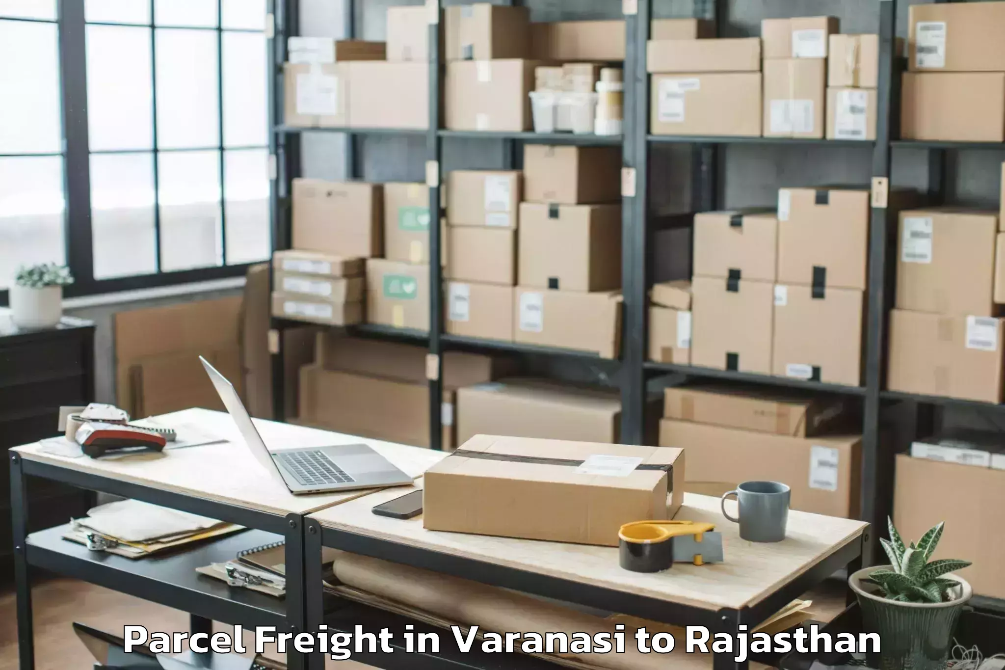 Book Varanasi to Falna Parcel Freight Online